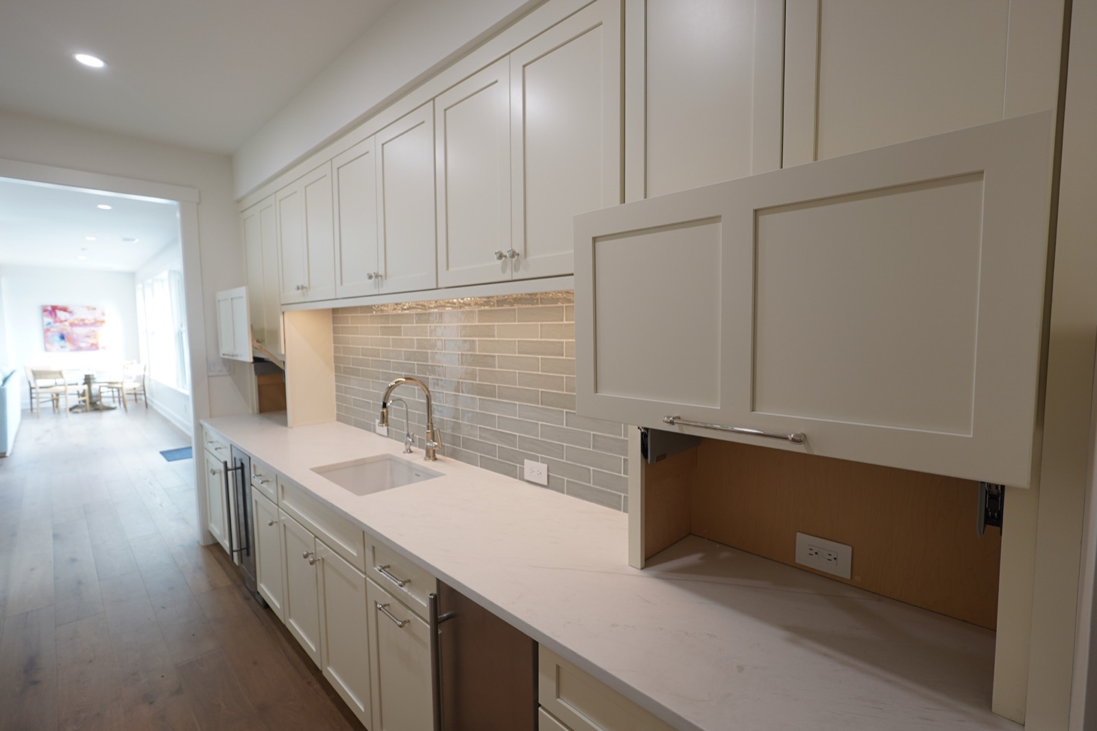 Appliance garage with a lift-up door by Shoreline Cabinet Company, Wilmington NC