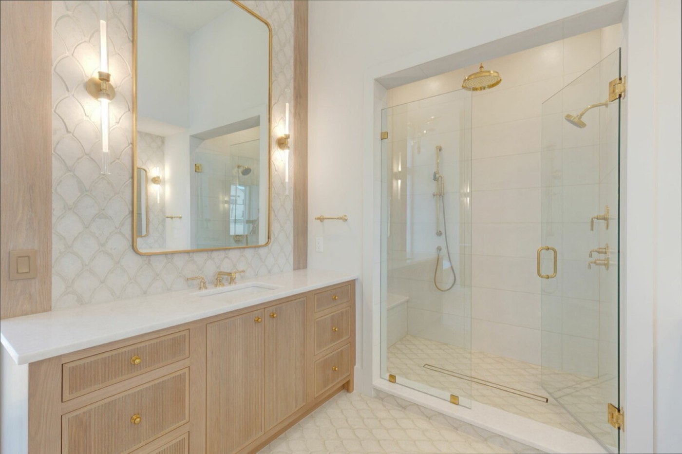 Covered Bridge Cabinetry Primary bath vanity (Royce inset, white oak), available at Shoreline Cabinet Company in Wilmington, NC