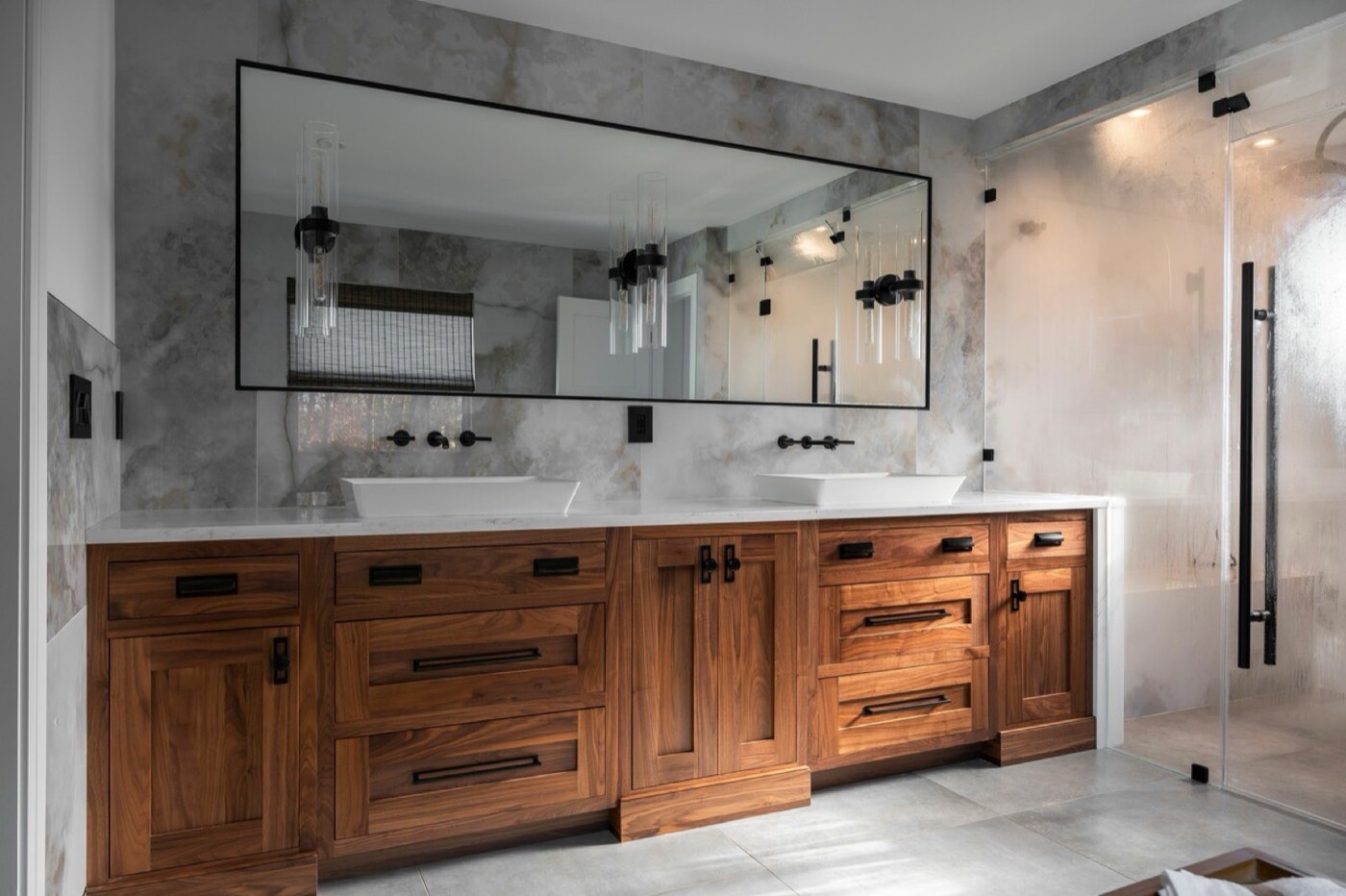 Covered Bridge Cabinetry Walnut primary bath vanity (Farmington), available at Shoreline Cabinet Company in Wilmington, NC