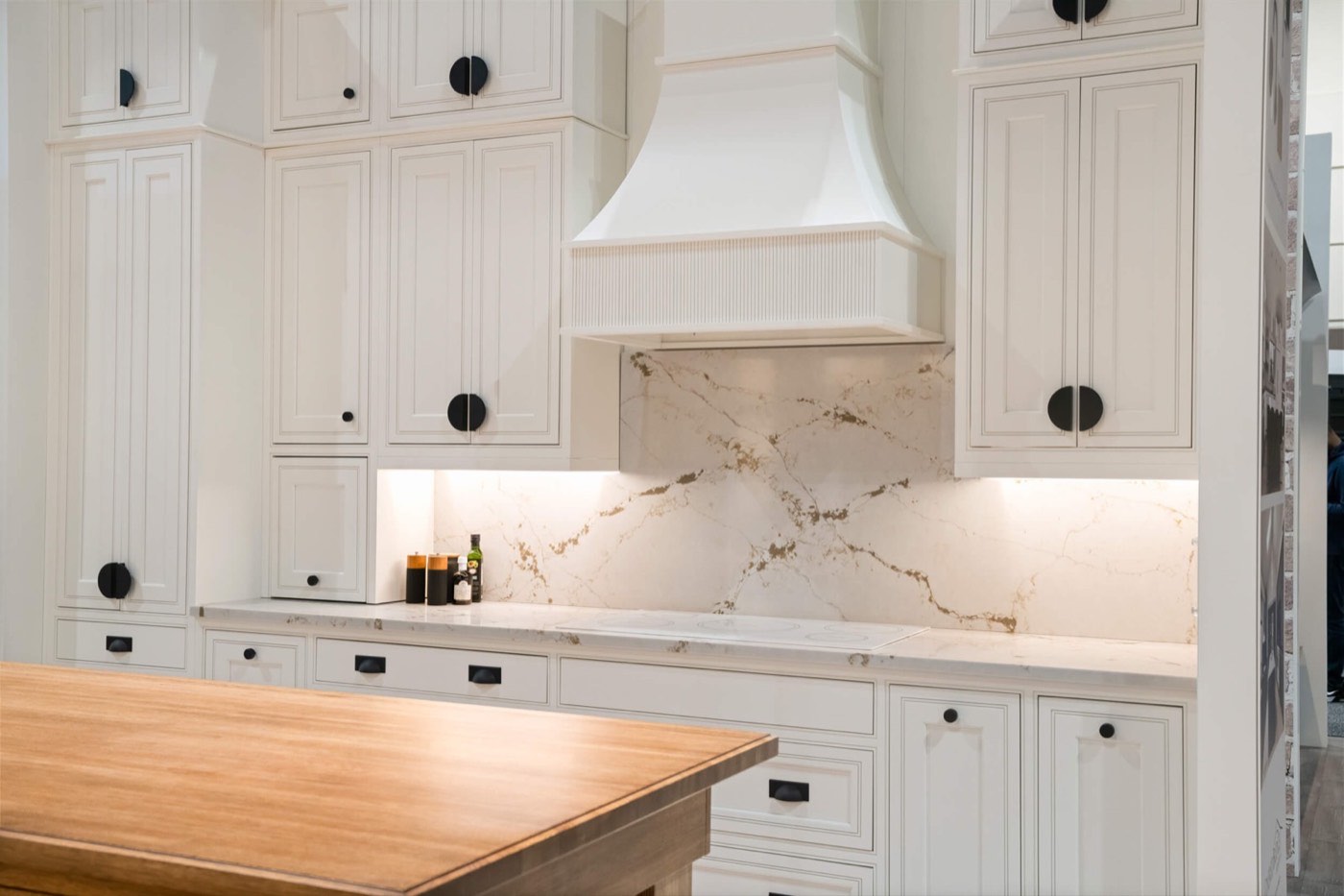 Covered Bridge Cabinetry Painted range hood display, available at Shoreline Cabinet Company in Wilmington, NC