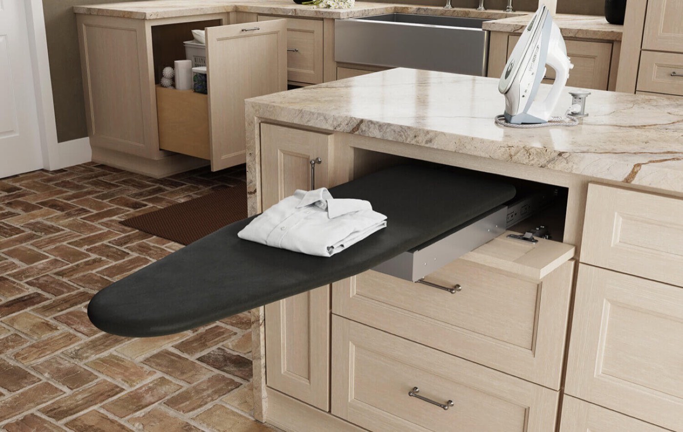 Dura Supreme Cabinetry Fold-out ironing board, available at Shoreline Cabinet Company in Wilmington, NC