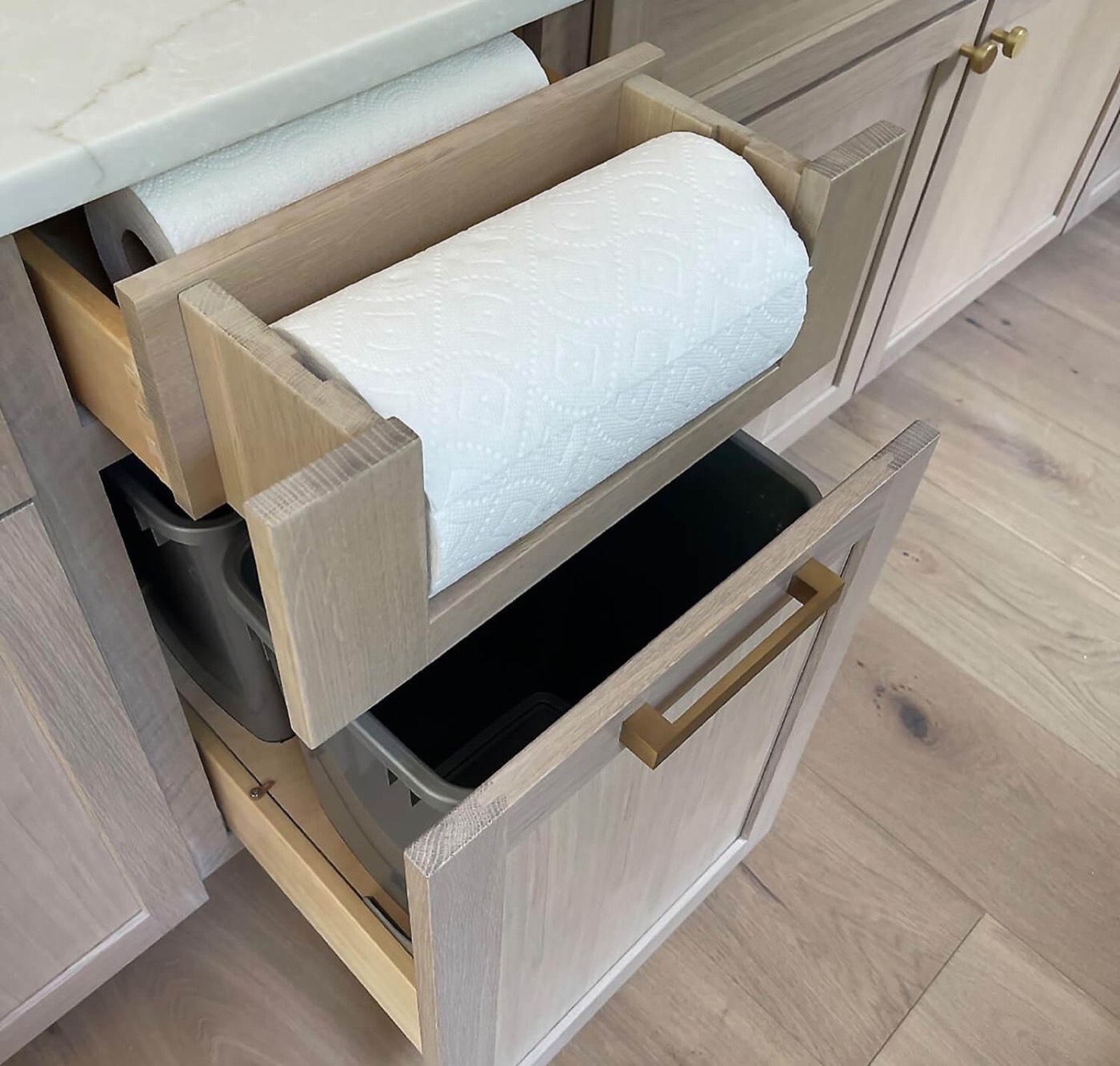 Dura Supreme Cabinetry Paper towel pull-out drawer, available at Shoreline Cabinet Company in Wilmington, NC