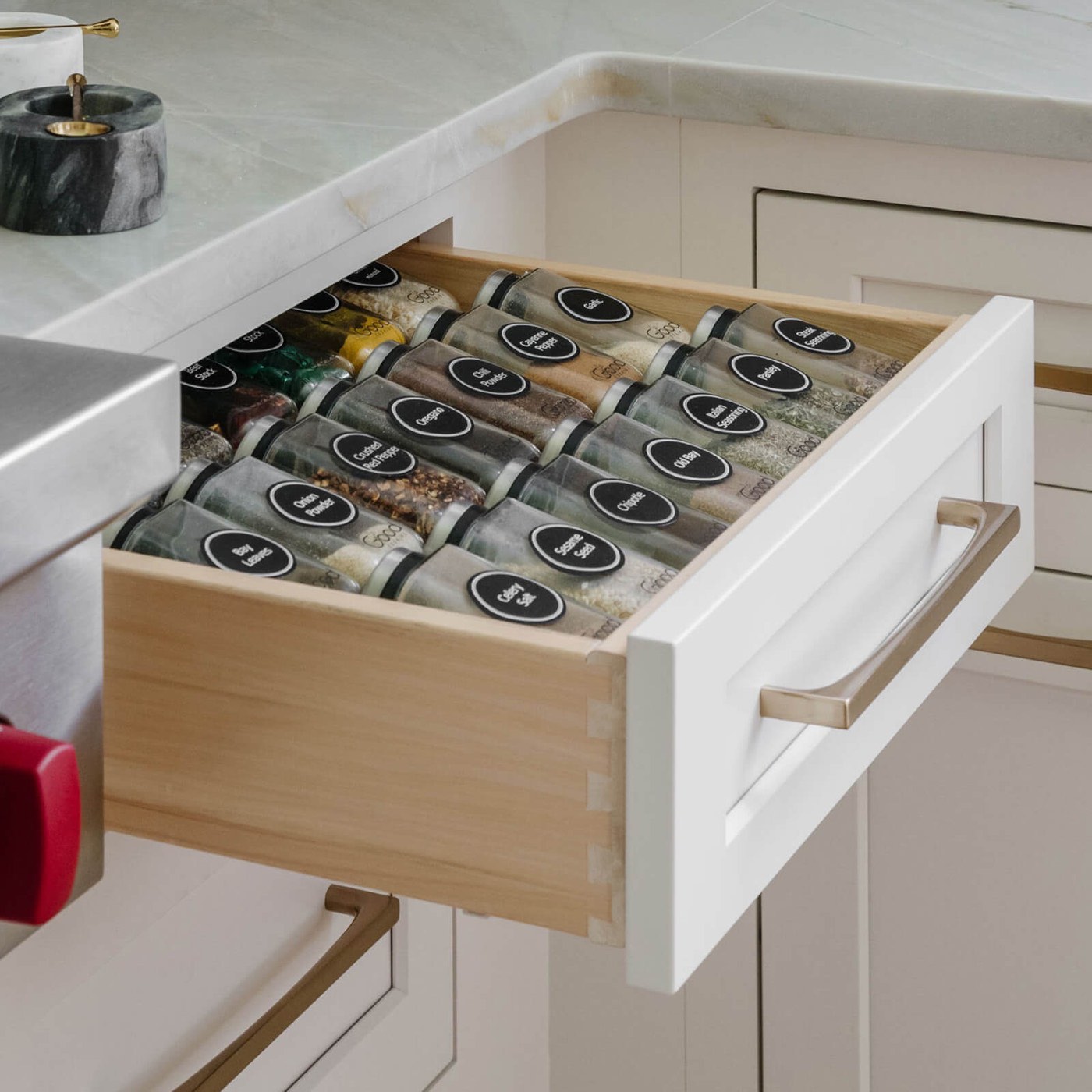 Dura Supreme Cabinetry Spice rack drawer insert, available at Shoreline Cabinet Company in Wilmington, NC