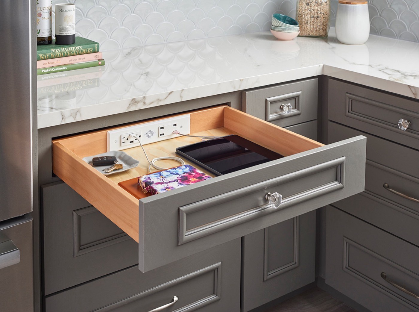 Hafele Gray kitchen, open drawer with Docking Drawer Blade Duo outlet, available at Shoreline Cabinet Company in Wilmington, NC