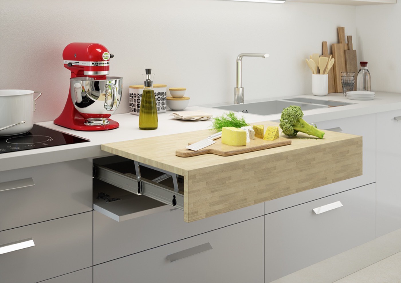 Hafele Kitchen island with Opla Top pull-out table fitting, available at Shoreline Cabinet Company in Wilmington, NC