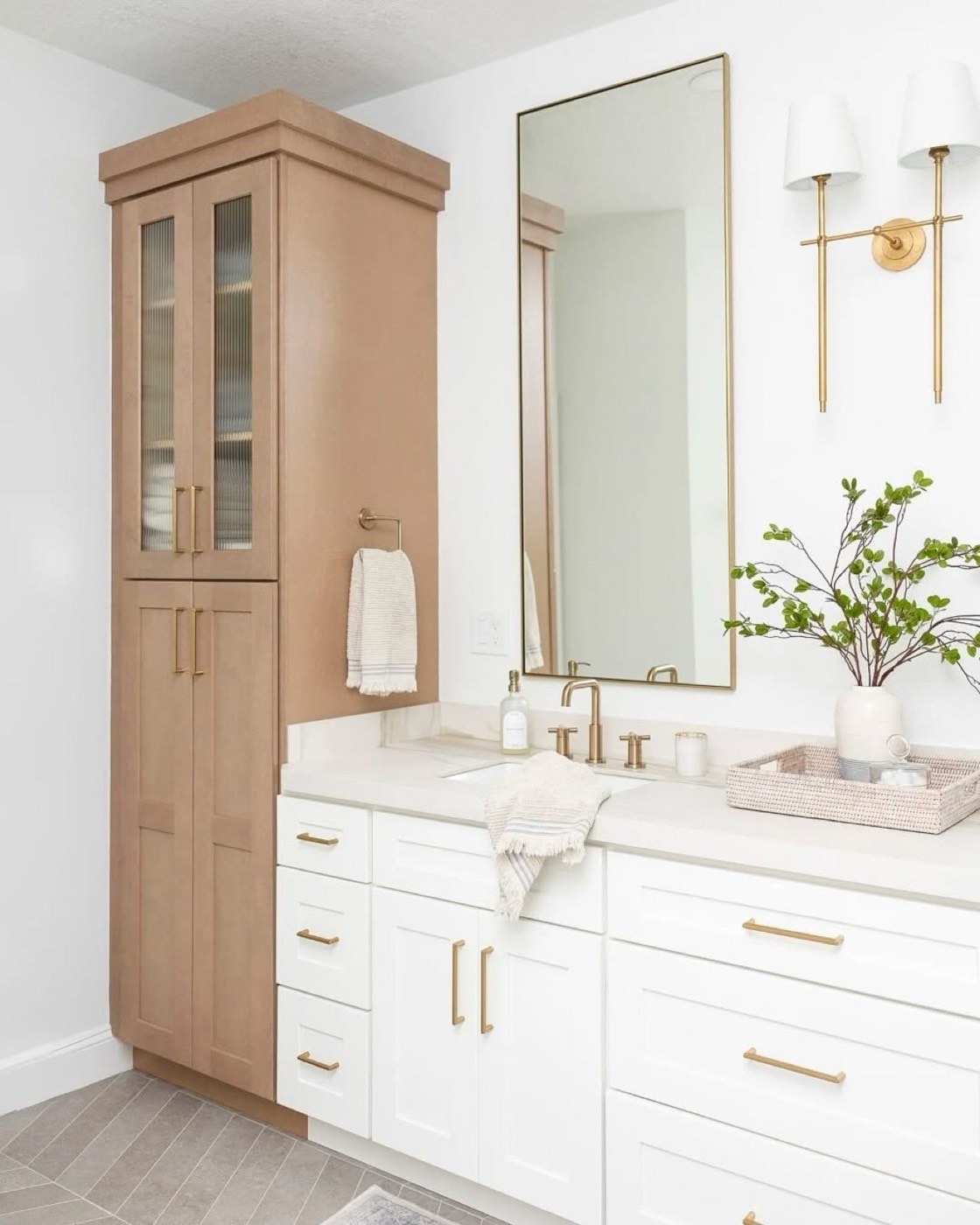 JSI Cabinetry Truffle linen closet tower with Essex White vanity, available at Shoreline Cabinet Company in Wilmington, NC