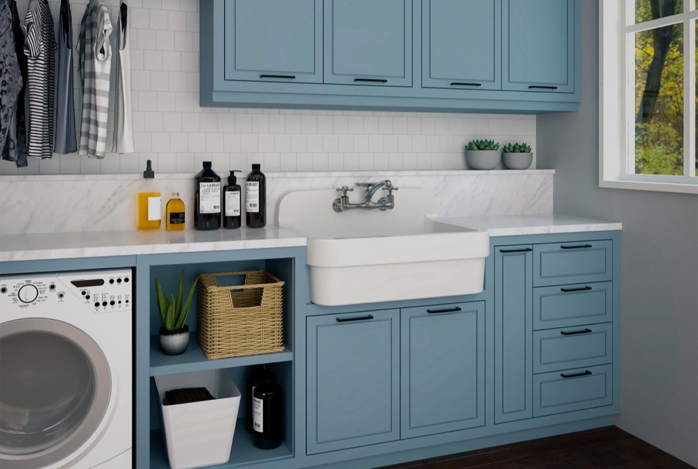 Nantucket Sinks Laundry room with blue cabinets and a farmhouse sink, available at Shoreline Cabinet Company in Wilmington, NC