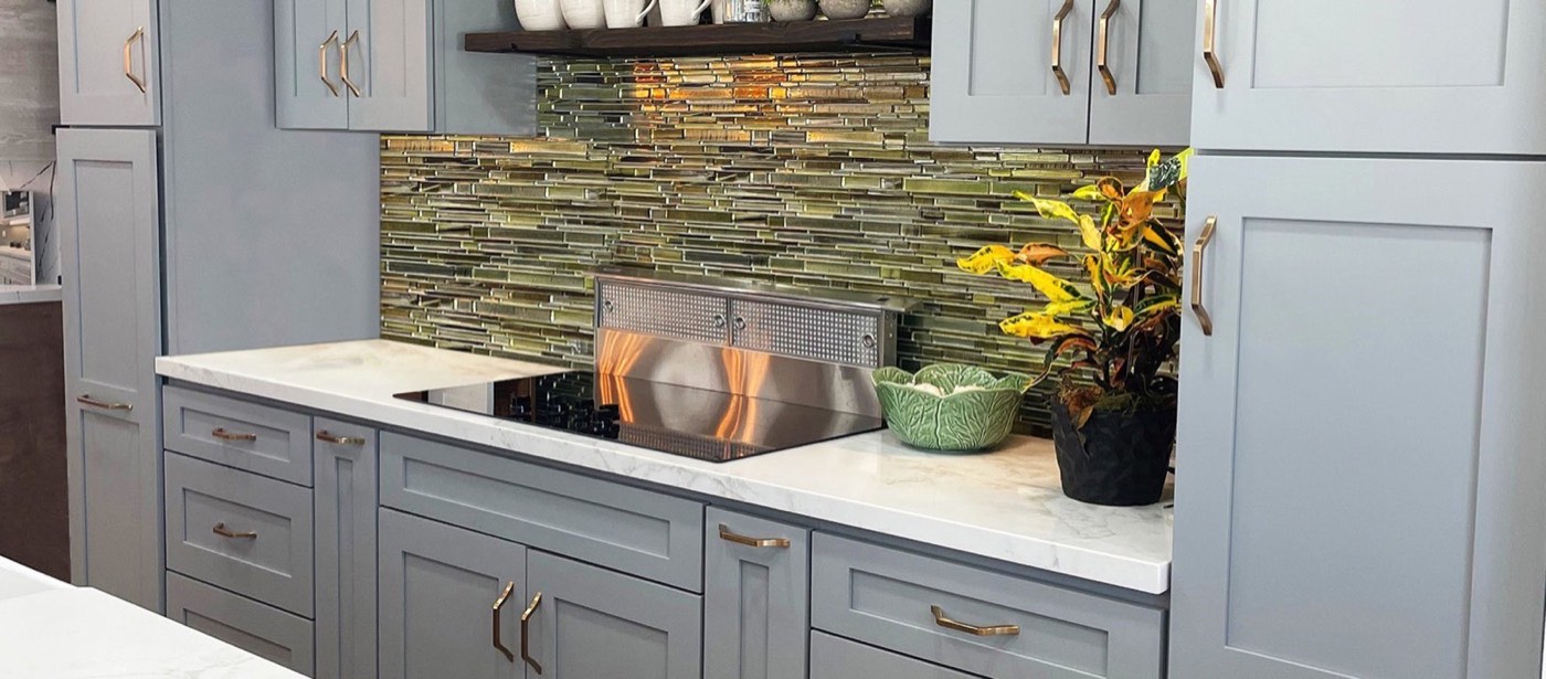 Pride Decor Gray kitchen with stone backsplash, available at Shoreline Cabinet Company in Wilmington, NC