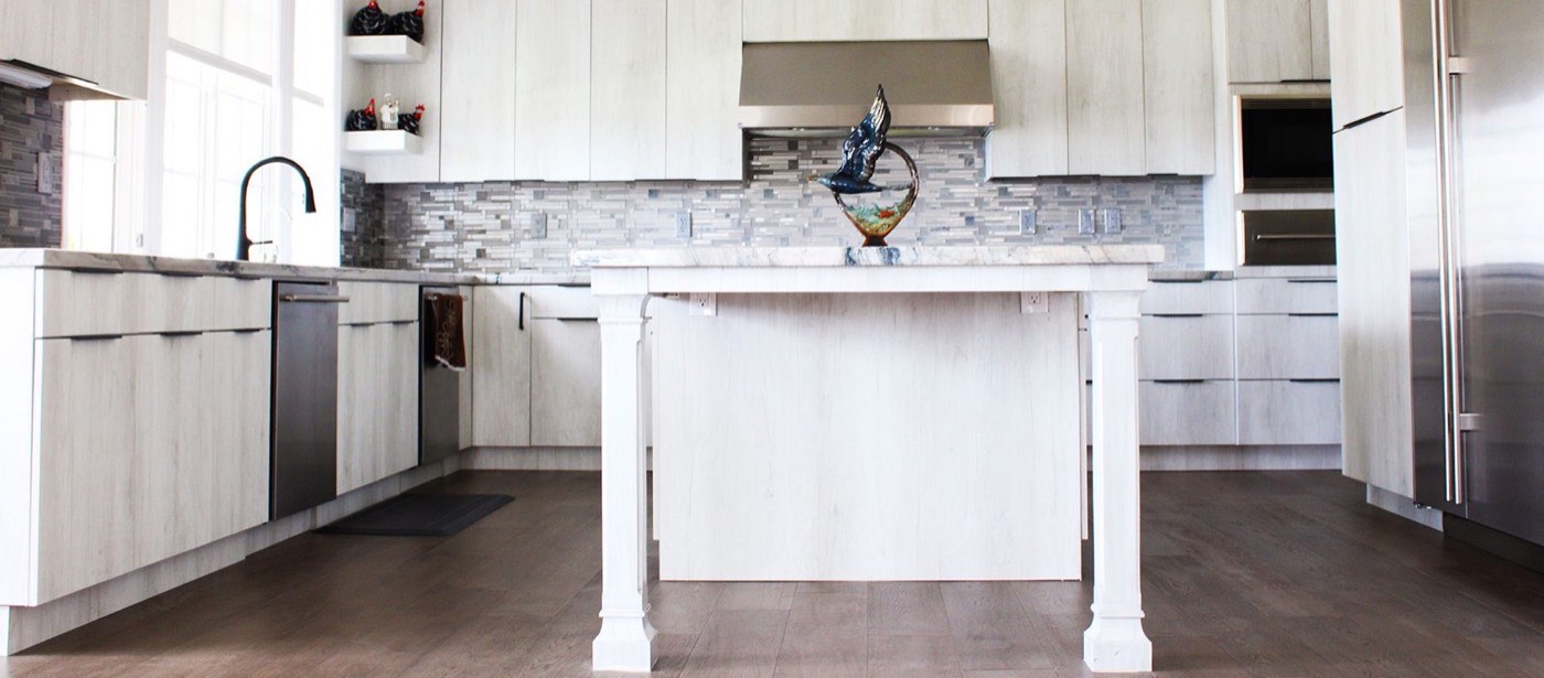 Pride Decor White kitchen with island, available at Shoreline Cabinet Company in Wilmington, NC