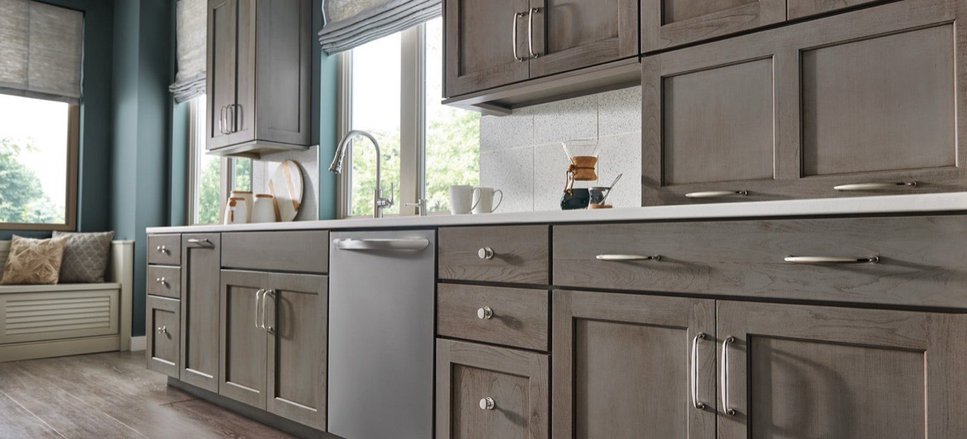 Top Knobs Asbury Collection, gray-wood kitchen, available at Shoreline Cabinet Company in Wilmington, NC