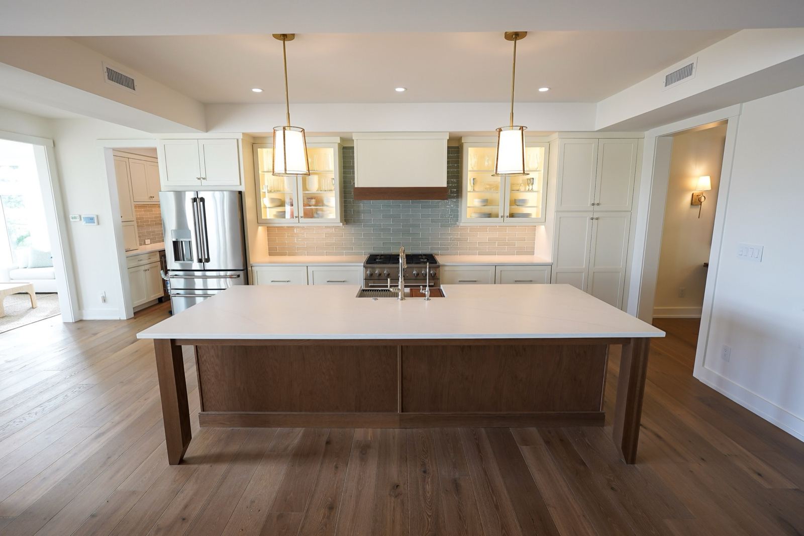 Stained oak kitchen island by Shoreline Cabinet Company, Wilmington NC