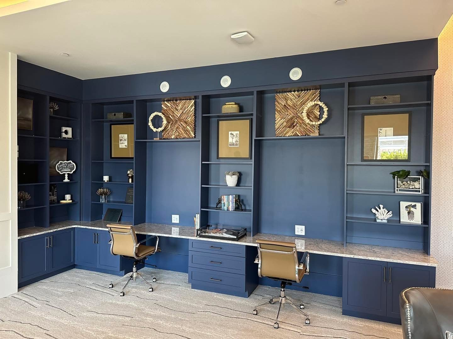 Navy built-in desk and shelving wall by Shoreline Cabinet Company, Wilmington NC