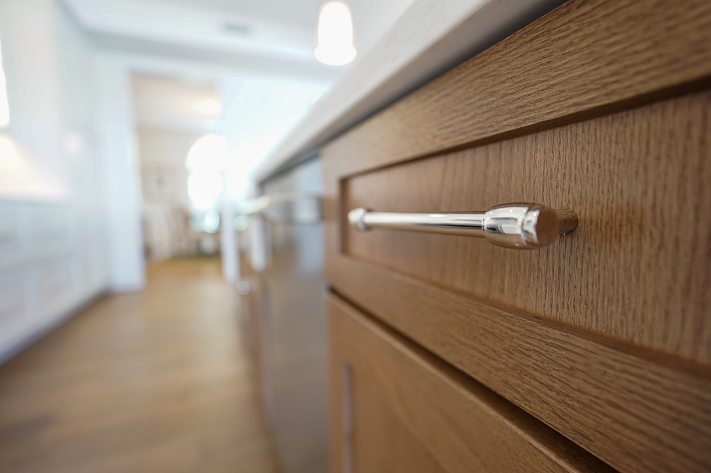 Close-up of an oak drawer front and pull by Shoreline Cabinet Company, Wilmington NC