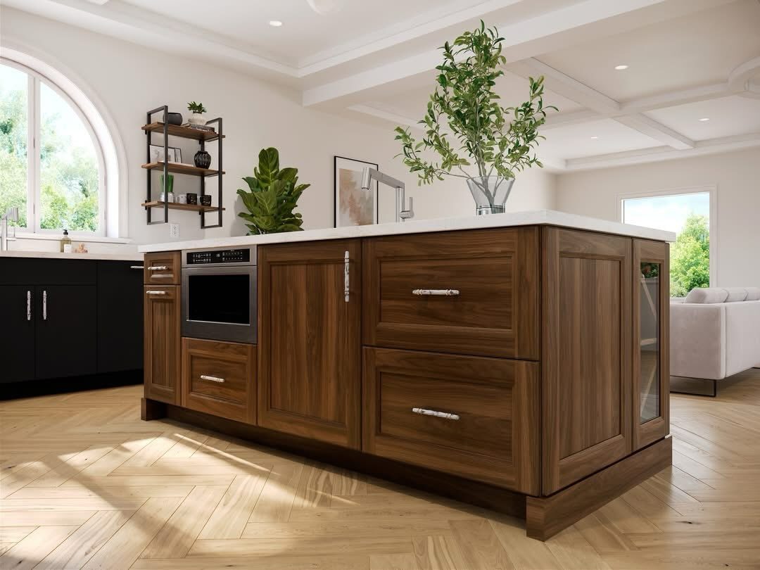 Walnut kitchen island with drawers under an arched window by Shoreline Cabinet Company, Wilmington NC
