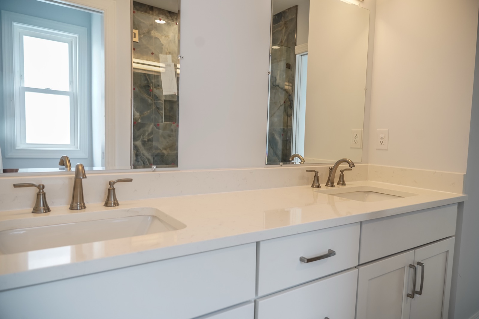 White double bathroom vanity by Shoreline Cabinet Company, Wilmington NC